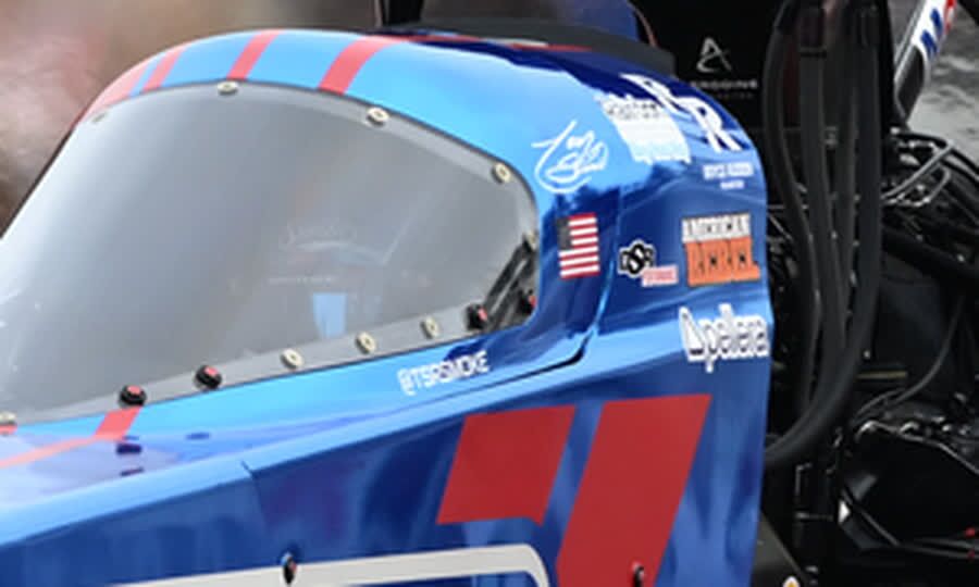 Close crop of the sponsor decals on the cowl of Tony Stewart's dragster